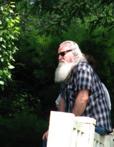 Santa listening to a summer concert on Carding green