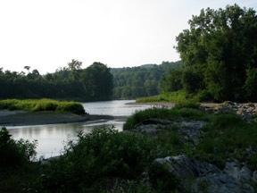 As the sun sets, the Corvus River gurgles over rock and stone as it says good night.